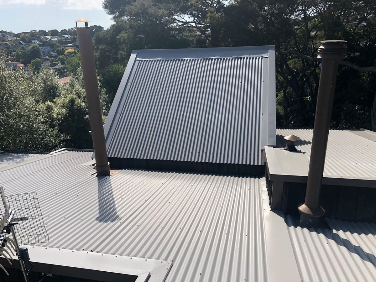 New long-run roofing on a commercial building