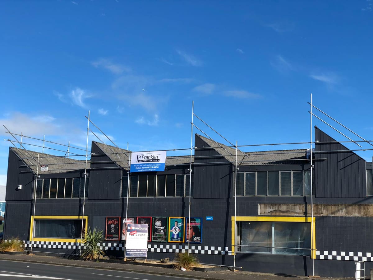Commercial building with an asbestos roof before re-roofing