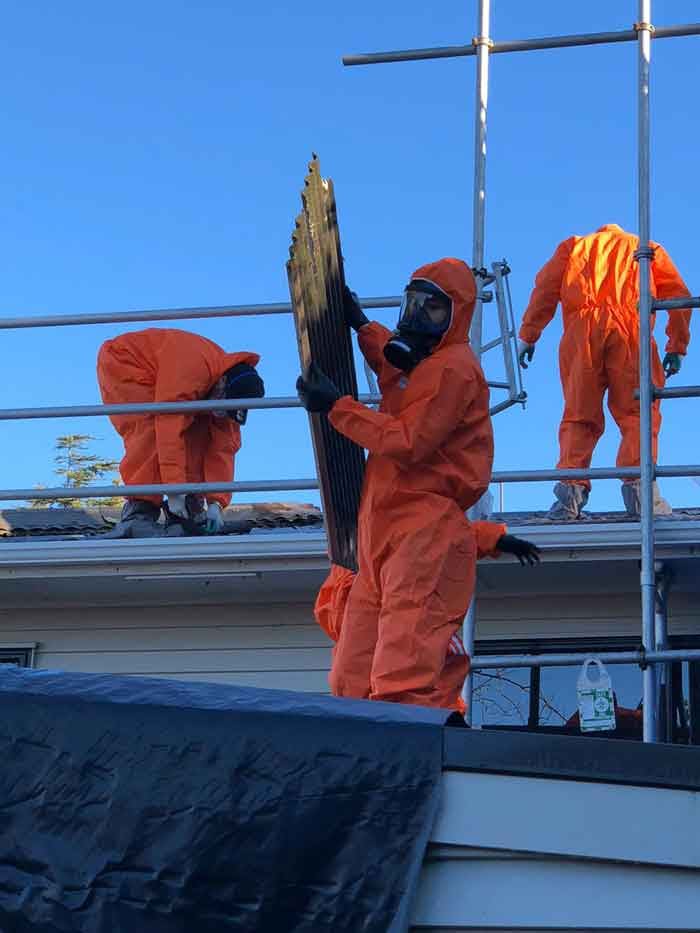 Asbestos removal crew at work