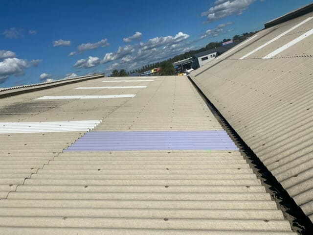 Asbestos roof repair in progress on a home in Onehunga, Auckland